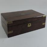 A 19th century rosewood and brass bound writing slope, with a fitted interior,