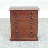 A 19th century stained pine collector's chest, containing six drawers,