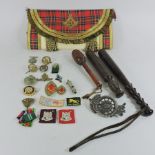 A collection of badges and buttons, some military, together with a Scottish mason's apron,