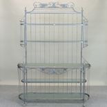 A painted metal graduated rack, with glass shelves,