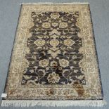 A Ziegler rug, on a blue ground,