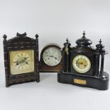 An Edwardian slate mantle clock, with a presentation plaque dated 1912, 35cm tall,