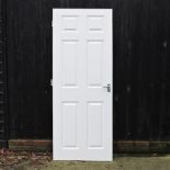 A collection of nine white painted interior doors,