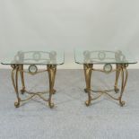 A pair of glass top coffee tables,