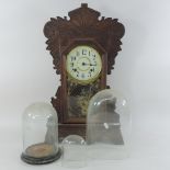 An early 20th century carved mantel clock, 58cm tall,