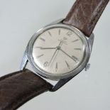 A 1970's Girard Perregaux gentleman's wristwatch, on a brown leather strap,