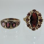 A 9 carat gold five stone gem set ring,