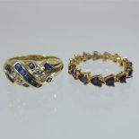 An unmarked yellow metal sapphire and diamond ring,