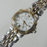 A Maurice Lacroix ladies stainless steel cased and gold plated wristwatch