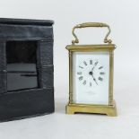 An early 20th century brass carriage clock, by Mappin and Webb, in a fitted case,