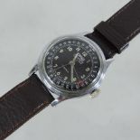 An Oris wristwatch, on a brown leather strap,