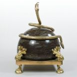 A French style bronze mounted marble centrepiece, surmounted by a snake, with acanthus decoration,