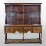 An 18th century style oak dresser,