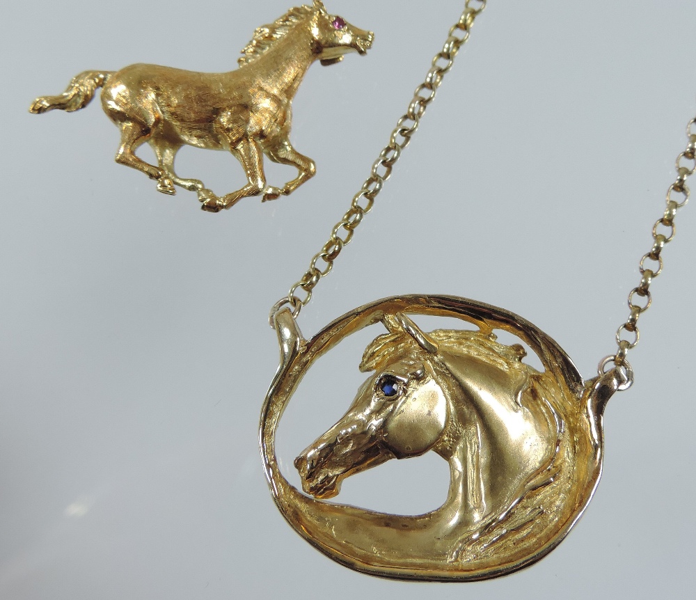 An 18 carat gold brooch, in the form of a galloping horse with ruby eyes 4cm long, - Image 2 of 6