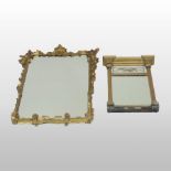 A Regency gilt framed wall mirror, having a verre eglomise panel, within a moulded surround,