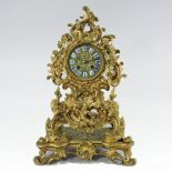 A 19th century ormolu cased eight day mantel clock in the rococo taste, the 3.