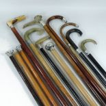 A collection of twelve mainly 19th century walking sticks, to include silver,