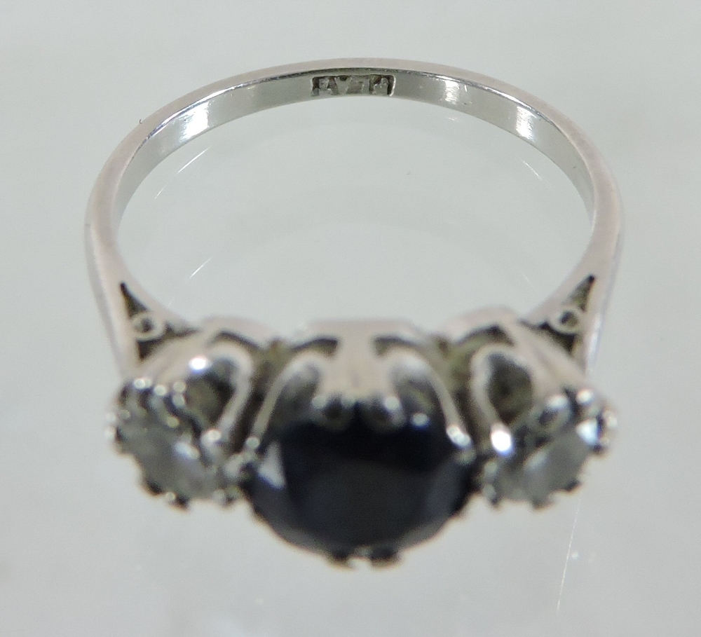 A platinum set sapphire and diamond three stone ring, - Image 3 of 5