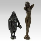 An Art Nouveau bronze desk seal, in the form of a young nude lady standing in rushes,