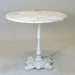 A Victorian white painted cast iron garden table, with a circular marble top, embossed mark for T.