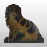 A 19th century painted pine dummy board, in the form of a seated spaniel,