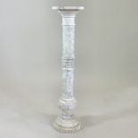 A veined white marble jardiniere stand, with Greek key decoration above a segmented knop,