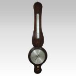 A 19th century mahogany cased wheel barometer, the arched case with stellar and chevron inlay,