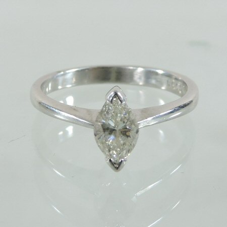 An 18 carat white gold marquise cut single stone diamond ring