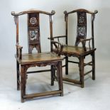 A pair of large 19th century Chinese elm open armchairs,