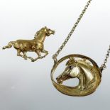 An 18 carat gold brooch, in the form of a galloping horse with ruby eyes 4cm long,