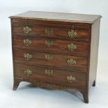 A George III mahogany chest, fitted with a brushing slide, above four long graduated drawers,