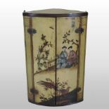 A George II japanned and chinoiserie decorated bow front hanging corner cabinet,