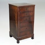 A 19th century French mahogany narrow chest, containing six short drawers, on turned feet,