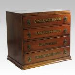 A late 19th century stained pine advertising chest, of small proportions, inscribed G.