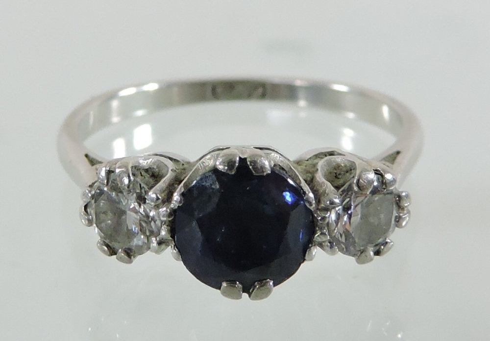 A platinum set sapphire and diamond three stone ring, - Image 2 of 5