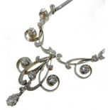 An Edwardian unmarked gold and platinum set diamond necklace,