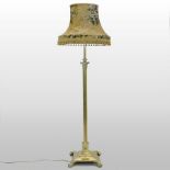 An early 20th century brass telescopic standard lamp and shade,