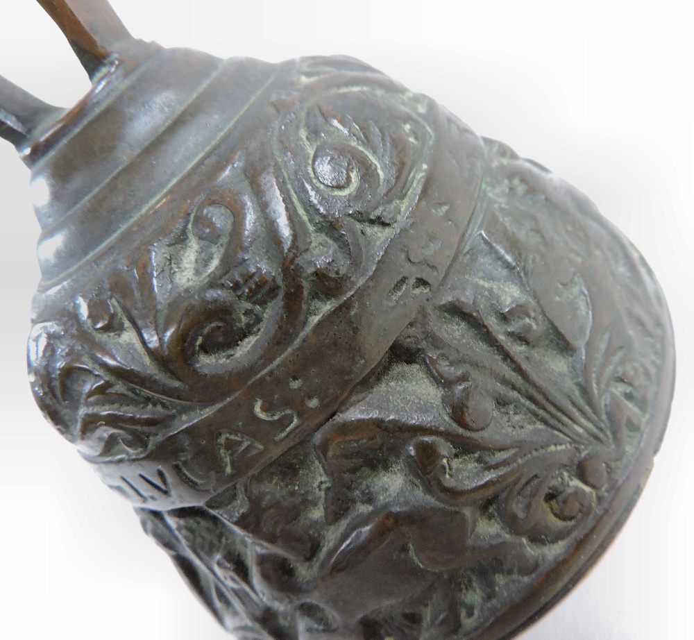 A small antique bronze bell, decorated in relief with a continuous frieze of figures, - Image 3 of 6