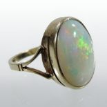 A 9 carat gold opal cabochon single stone ring,