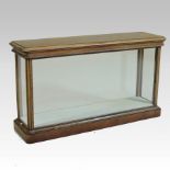 A 19th century mahogany and glazed table top display case, with removable glass side panels,