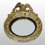 A Regency carved pine and gilt gesso framed convex wall mirror,