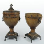 A pair of Edwardian carved oak and brass mounted urns, of classical shape,