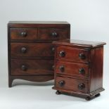 An early 19th century mahogany apprentice chest, with ebony stringing,