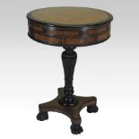 A Regency amboyna and ebony drum shaped work table,