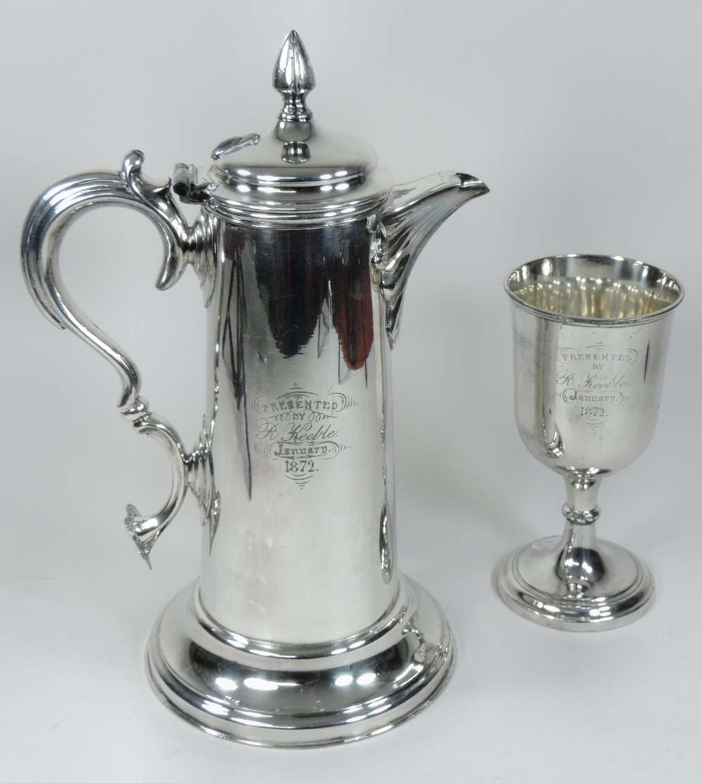 A Victorian silver plated flagon, of tapered shape with a hinged lid and scrolled handle, - Image 2 of 2
