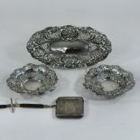 A pair of Edwardian pierced silver bon-bon dishes, with repousse decoration, Birmingham 1905, 11cm,
