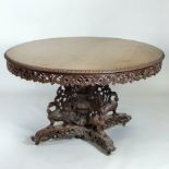 A 19th century Burmese carved hardwood breakfast table,