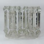 A pair of 19th century clear glass table lustres, each having a knopped stem and faceted base,