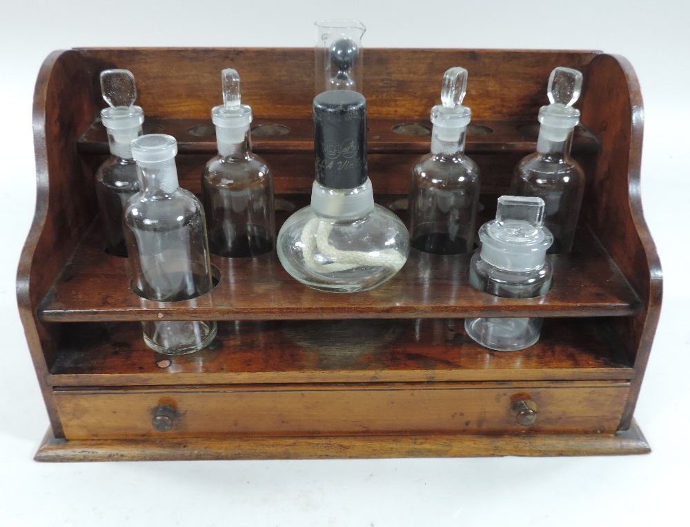 A 19th century mahogany apothecary stand, containing seven various glass jars, with a drawer below, - Bild 3 aus 16