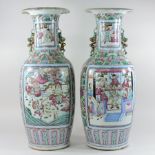 A pair of large Chinese Canton porcelain vases, each of baluster shape,